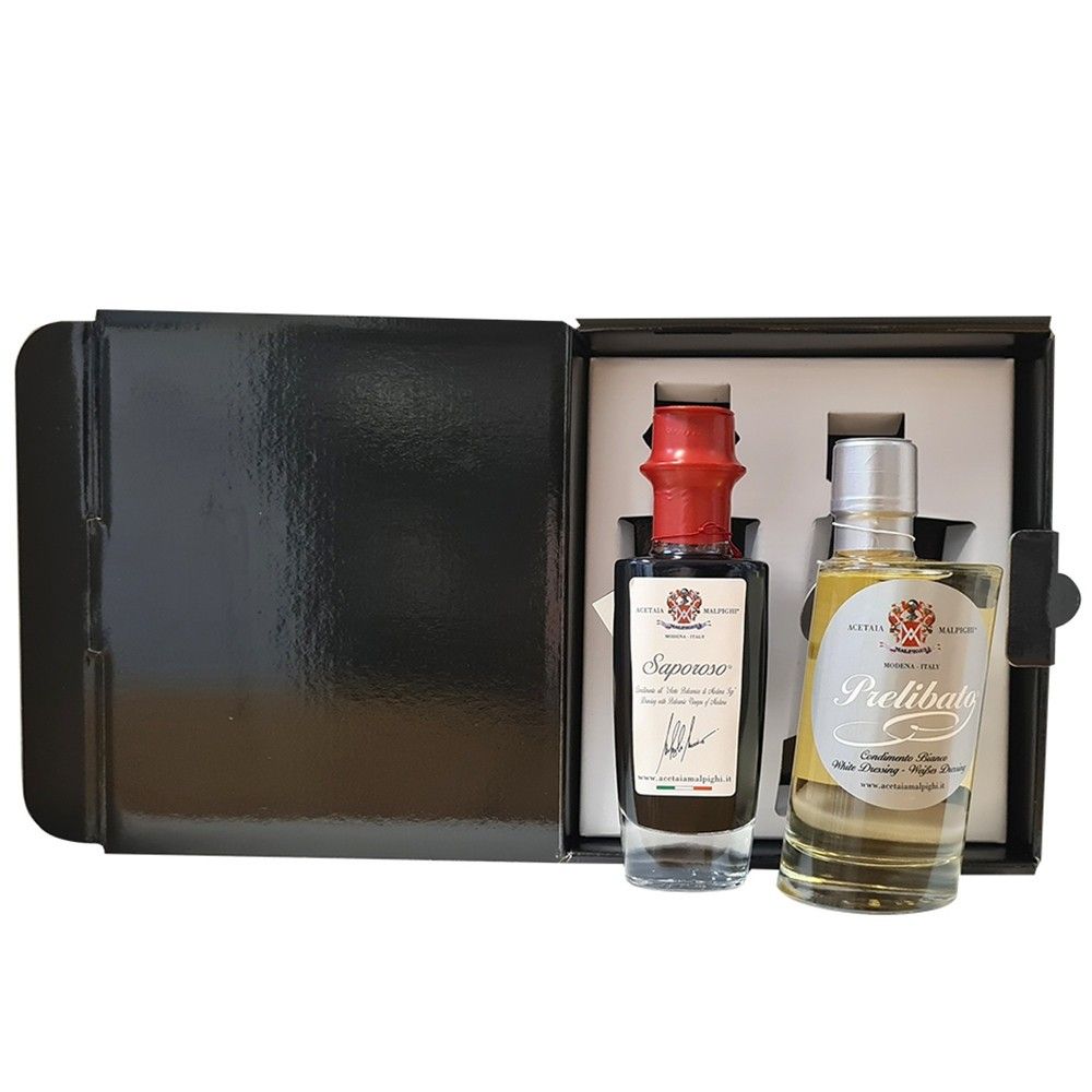 Un sofisticato cofanetto regalo custodisce due bottiglie gourmet, Saporoso e Prelibato, in un perfetto connubio di sapori Terra e Mare.