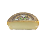 Genießen Sie die Intensität des toskanischen Bio-Pecorino, der in Höhlen gereift ist und eine geölte Rinde hat. Etruskische Tradition in jedem Bissen.