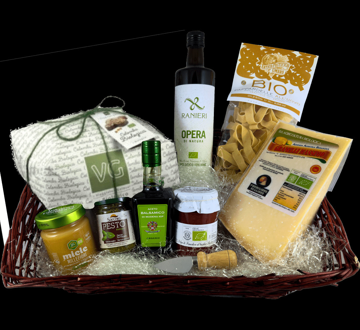Celebra la Pasqua con un cesto biologico: Parmigiano, olio, aceto, pasta e Colomba, per un gusto naturale e tradizionale.