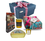 Entdecken Sie ein einzigartiges kulinarisches Erlebnis mit unserer Gourmet-Box zu Ostern, die Colomba, Parmigiano, Pecorino, Honig und Trüffelöl enthält.