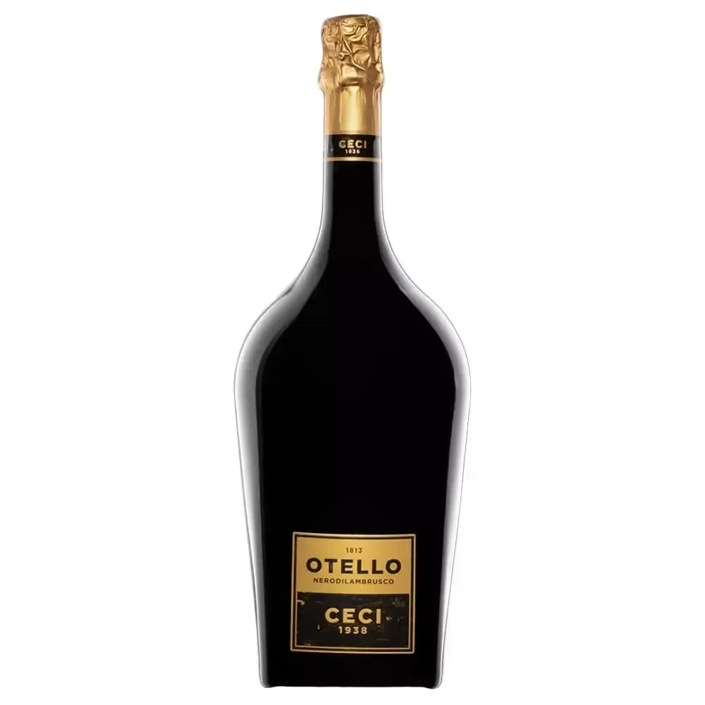 Un'ampolla Magnum di Lambrusco Otello NERODILAMBRUSCO, distinguendosi per la sua etichetta dorata raffinata e un tappo dello stesso colore; un vino rosso frizzante.