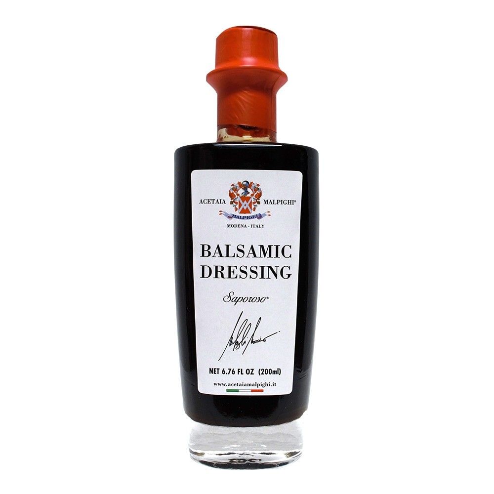 Elegant Terra & Mare gift box containing a refined bottle of Saporoso balsamic vinegar, a symbol of Italian tradition.