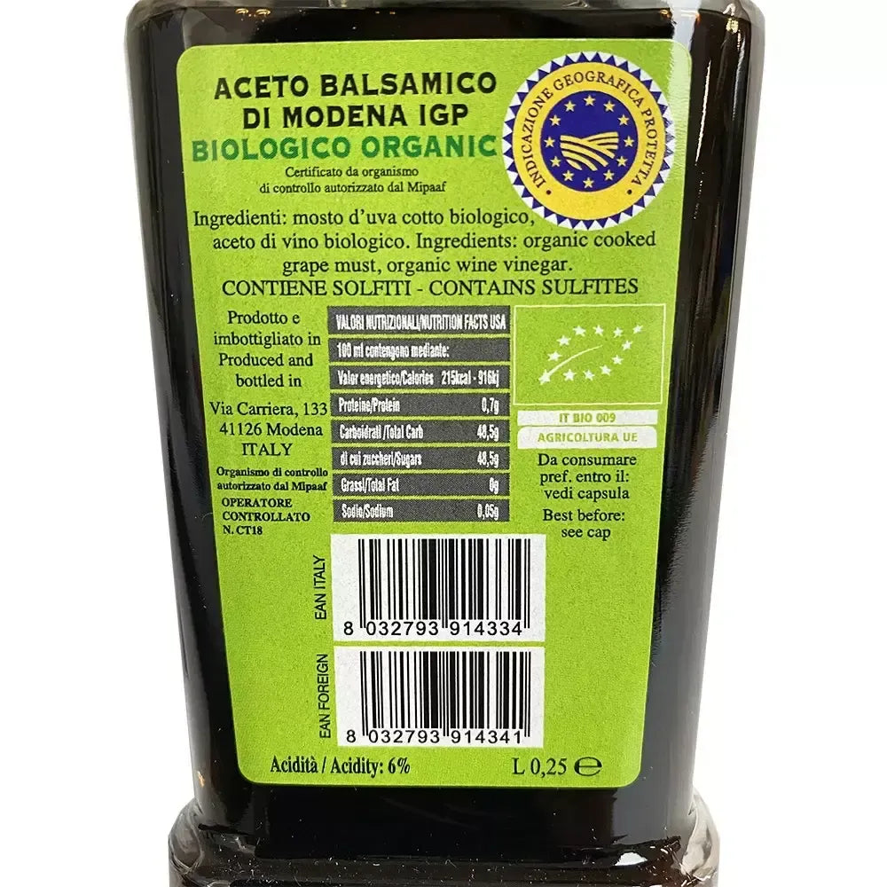 Das Foto zeigt eine 1,25-Liter-Flasche Aceto Balsamico di Modena IGP, zertifiziert biologisch mit grünem Etikett und hervorgehobenem IGP-Symbol.