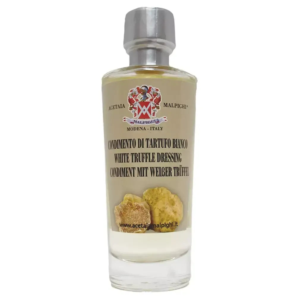 Perfetta per gourmet, una bottiglia di condimento al tartufo bianco con etichetta artistica, ideale per creare piatti deliziosi.