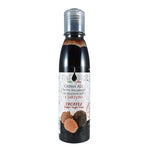 Una bottiglia di crema raffinata all'aceto balsamico e tartufo, con la sua etichetta sofisticata e foto di tartufi, ideale per arricchire piatti gourmet.