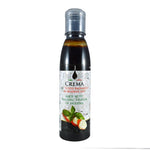 Un trio di sofisticate bottiglie di Creme all'Aceto Balsamico, con etichette raffinate, ideali per esaltare la complessità dei piatti gourmet.