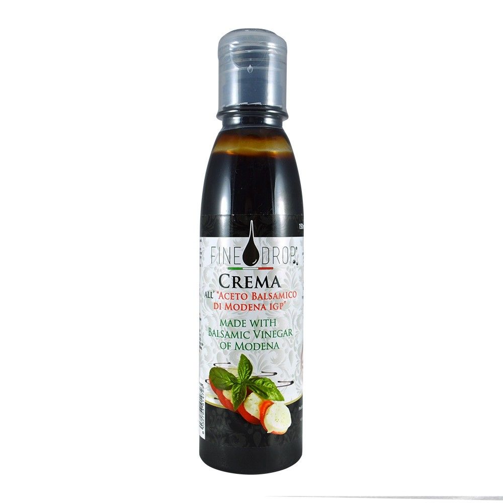 Un trio di sofisticate bottiglie di Creme all'Aceto Balsamico, con etichette raffinate, ideali per esaltare la complessità dei piatti gourmet.