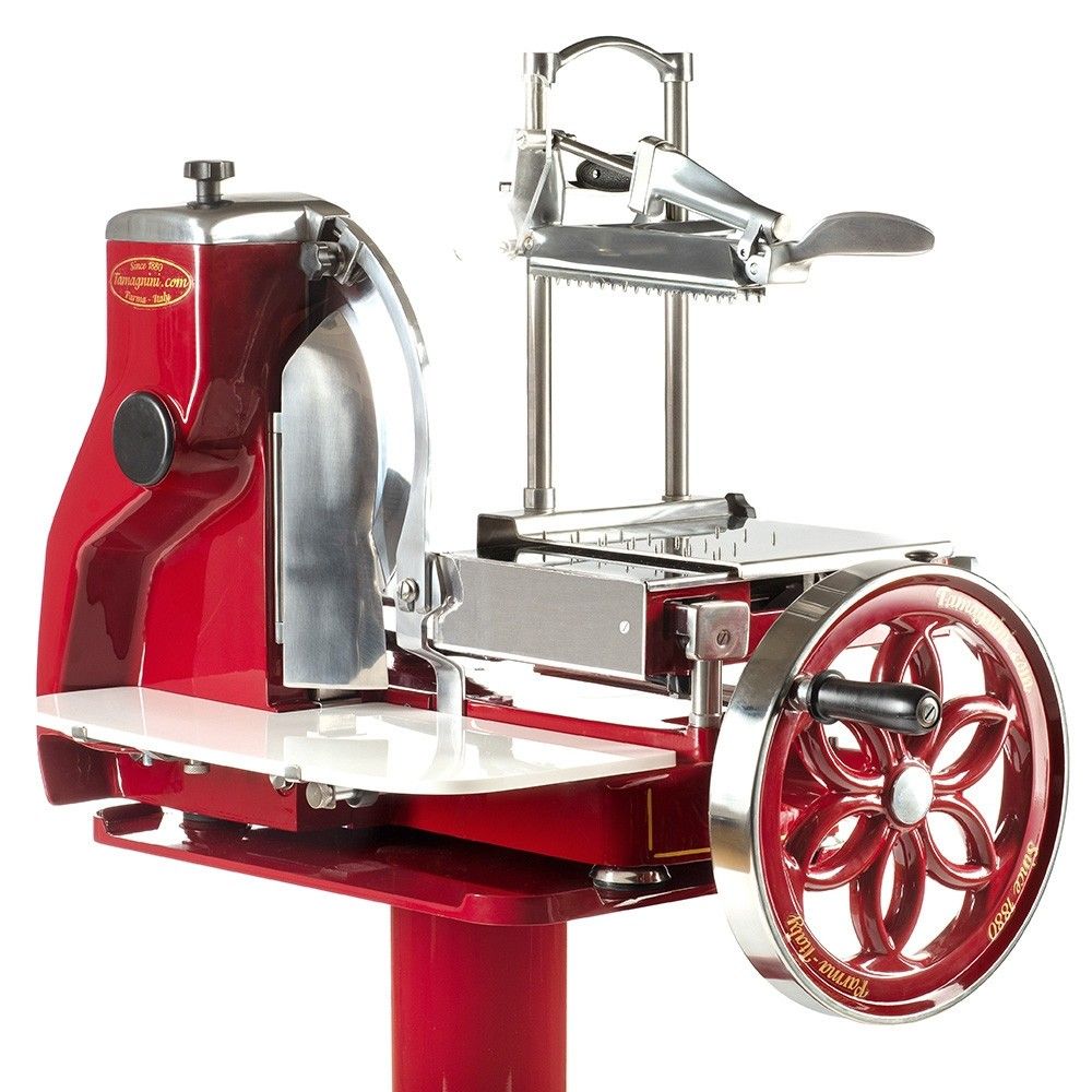 Modello 330, l'affettatrice a volano manuale, perfetta per salumi e prosciutto crudo, offre precisione e tagli uniformi. Realizzata in materiali di alta qualità, è un elegante complemento per ogni cucina.
