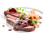 Un filetto di carne impreziosito da una salsa biologica di ciliegie e zenzero, esaltando il gusto gourmet.