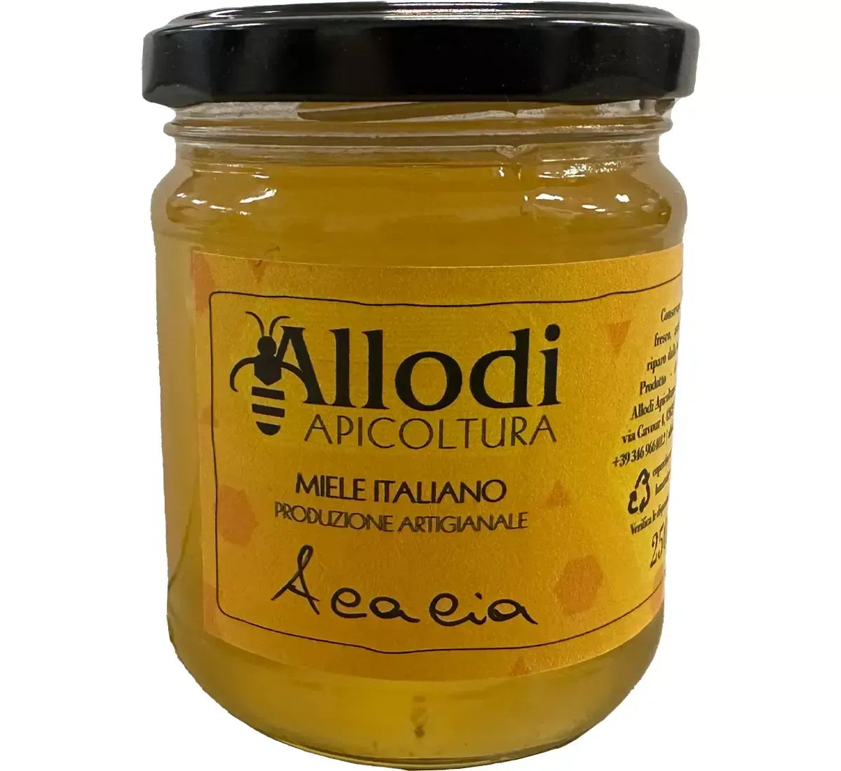 Vista di un barattolo di Miele Millefiori Paradiso Allodi, prodotto artigianale italiano, con un'etichetta gialla che presenta dettagli sull'apicoltura.