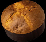 Immagina un panettone artigianale al limoncello, avvolto a mano, con la sua crosta dorata e l'interno soffice. Ideale per celebrare le feste.