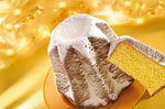 Uno stellare pandoro tradizionale, soffice e dolce, riposa su un piatto dorato, pronto a impreziosire le tue festività.