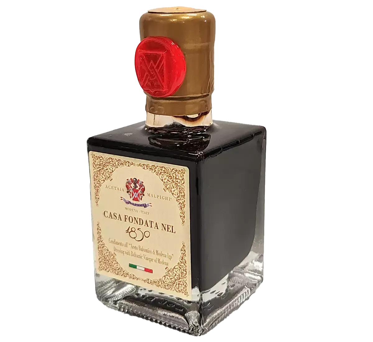 Un'elegante bottiglia di aceto balsamico di Modena IGP, prodotto dalla storica Casa fondata nel 1850, sigillata con un tappo dorato e un sigillo rosso.