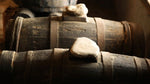 Antiche botti di legno conservano l'aceto balsamico tradizionale DOP di Reggio Emilia, esalando storia e autenticità.