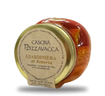 Un vasetto dorato di giardiniera artigianale in agrodolce di Roberta, ricca di verdure colorate e dal sapore autentico italiano.