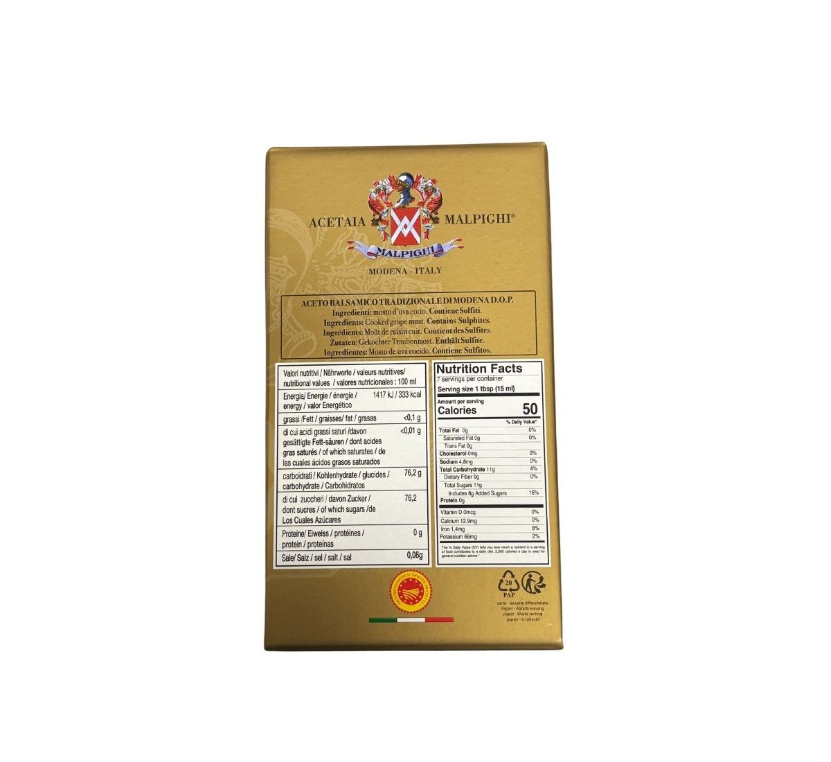 Una scatola dorata custodisce l'Aceto Balsamico Tradizionale di Modena DOP Il Ciliegio, con un'etichetta elegante che rivela i dettagli nutrizionali.