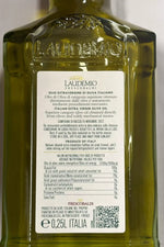 Elegante cofanetto contenente Il Pinzimonio, olio extra vergine d'oliva Laudemio, in una bottiglia trasparente con etichetta informativa.