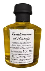 Raffinata bottiglia da 100 ml di olio al tartufo, ideale per donare un tocco di eleganza ai tuoi piatti natalizi.