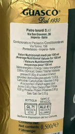 Guasco Olio Extravergine presentato in una raffinata bottiglia dorata, con etichetta ricca di dettagli, orgoglio dell'Italia dal 1930.