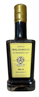 Aceto balsamico di Modena IGP Gold, presentato in una bottiglia di vetro scuro, con un'etichetta dorata, perfetto per elevare il tuo pinzimonio gourmet.