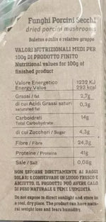 Una confezione trasparente mostra i funghi porcini secchi di qualità speciale, con la tabella nutrizionale dettagliatamente illustrata sul retro.