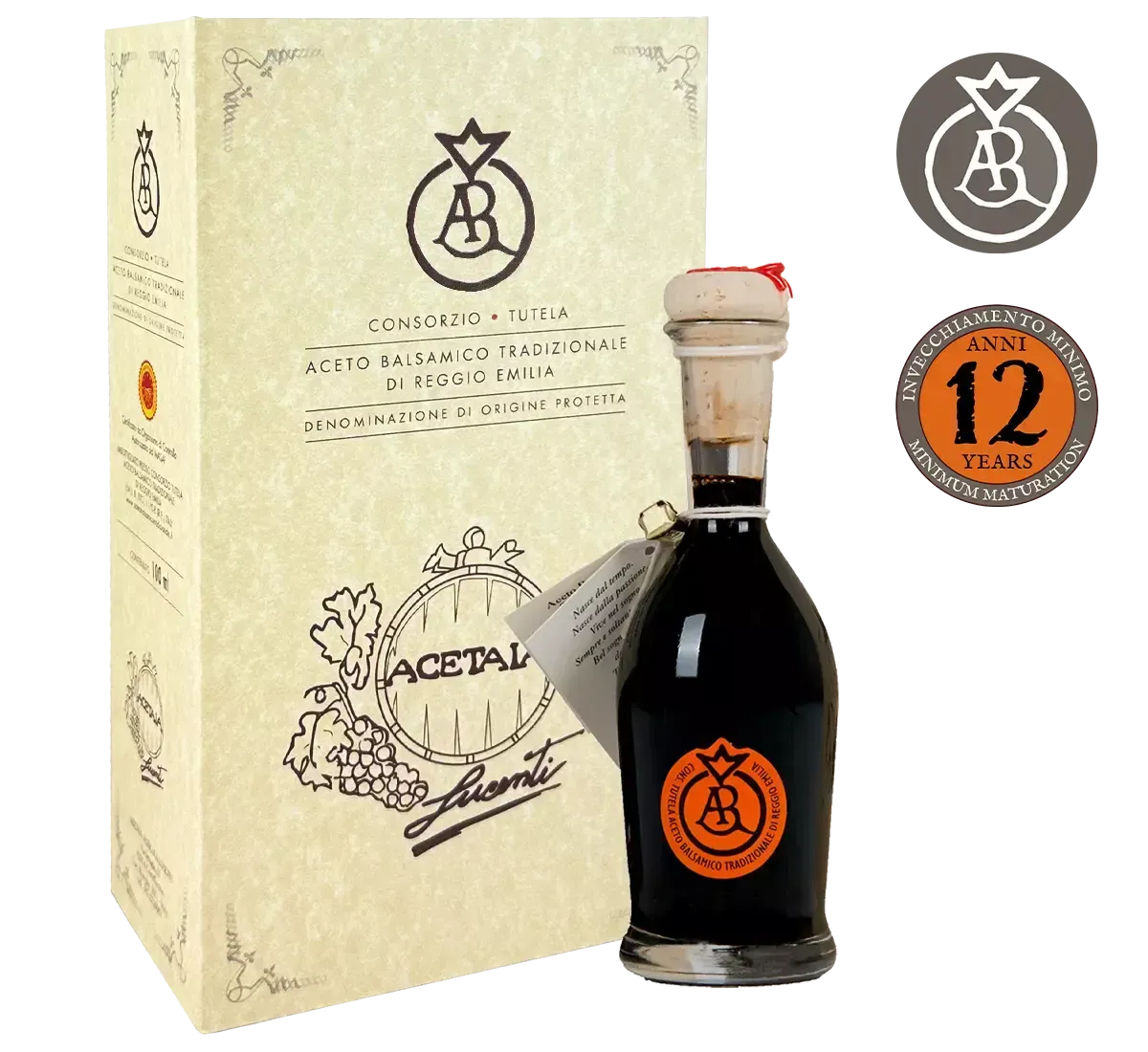 Una scatola accanto a una bottiglia di Autentico Aceto Balsamico Tradizionale di Reggio Emilia, etichettato come invecchiato per 12 anni, su uno sfondo luminoso.