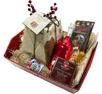 Il Cesto Barney Natale, con salumi, cioccolatini, vino rosso, biscotti e panettone, è l'ideale per festeggiare in stile gourmet.