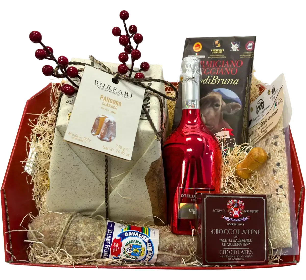 Un cesto natalizio ricco di delizie: salumi, cioccolatini, pandoro e vino rosso, l'ideale per celebrare le feste in compagnia.