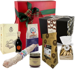 Un regalo gastronomico di lusso per Natale, contenente Parmigiano di 60 mesi e Aceto Balsamico invecchiato, simboli dell'eccellenza italiana.