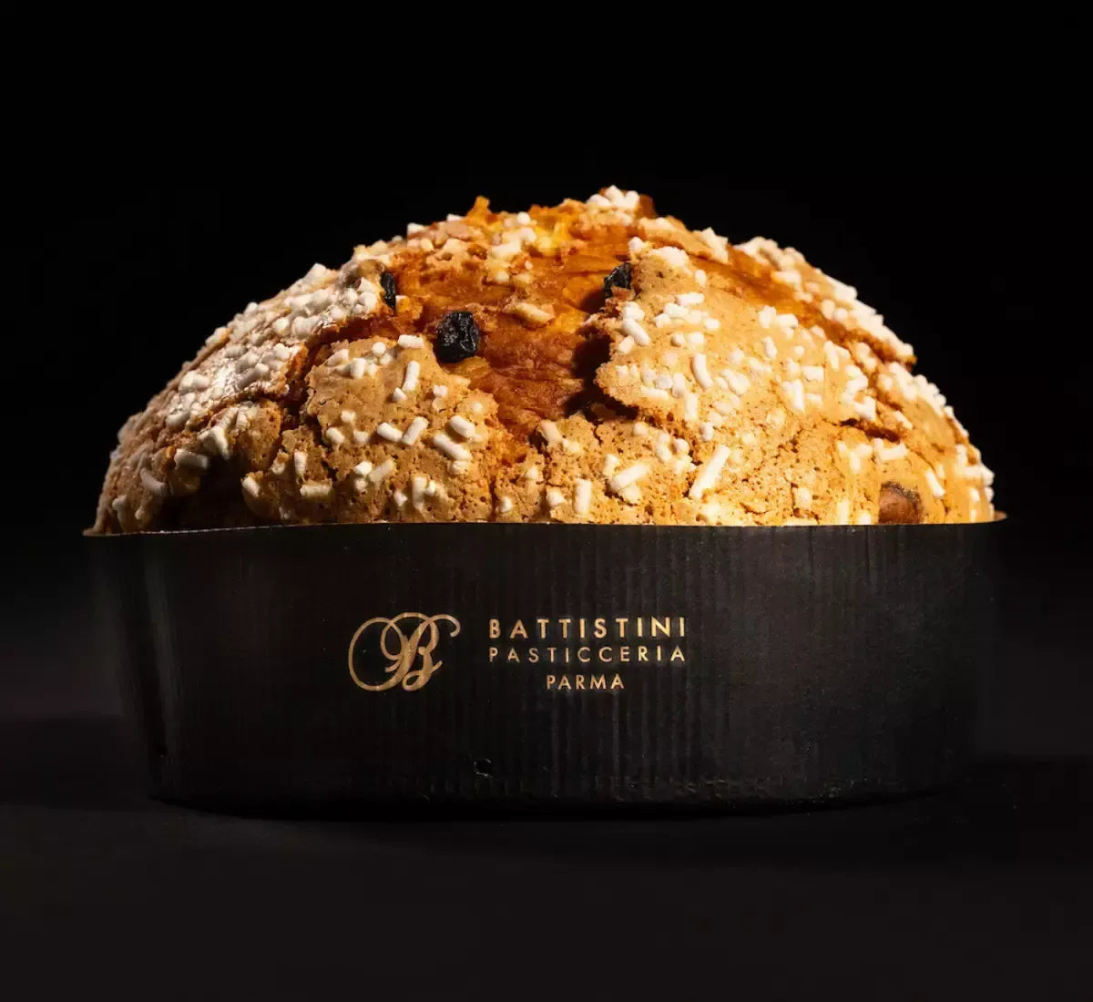 Scatola regalo contenente un panettone artigianale tradizionale, riccamente farcito di uvetta e canditi, perfetto per festeggiare Natale e occasioni speciali.