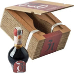 Packaging ecologico e ricercato avvolge una bottiglia sferica di Aceto Balsamico Tradizionale di Modena DOP, decisamente elegante.