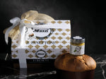 Dolce di Natale artigianale farcito con crema al pistacchio in confezione regalo.