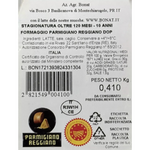 Scopri la confezione di Parmigiano Reggiano DOP Bonat, stagionato 10 anni, con sigilli di qualità ed etichette informative.