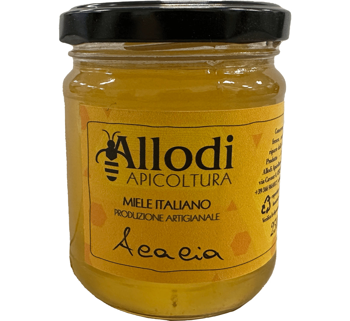 Un vasetto di miele artigianale italiano, dal colore dorato dell'Acacia, è adornato con un'etichetta elegante e un tappo nero. La sua presenza è delicata ed elegante.